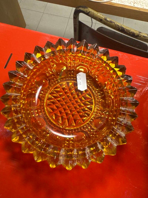 Vintage amber glass piece featuring textured diamond point pattern and a scalloped, jagged rim- vintage***