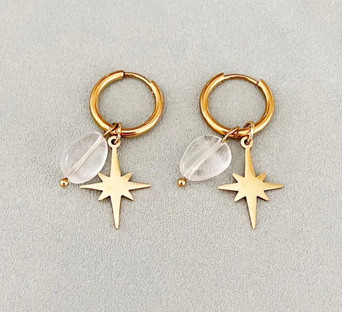 Witte star oorbellen