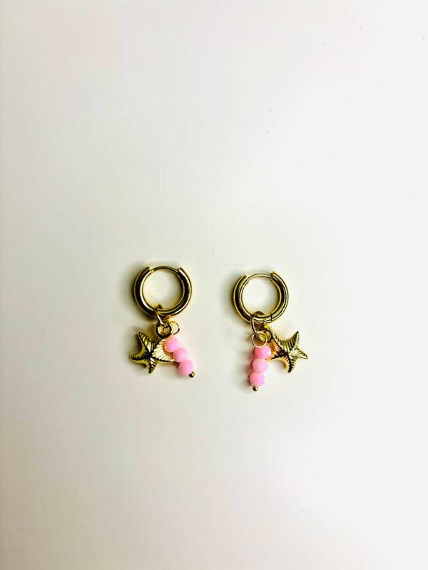 Licht roze seastar oorbellen