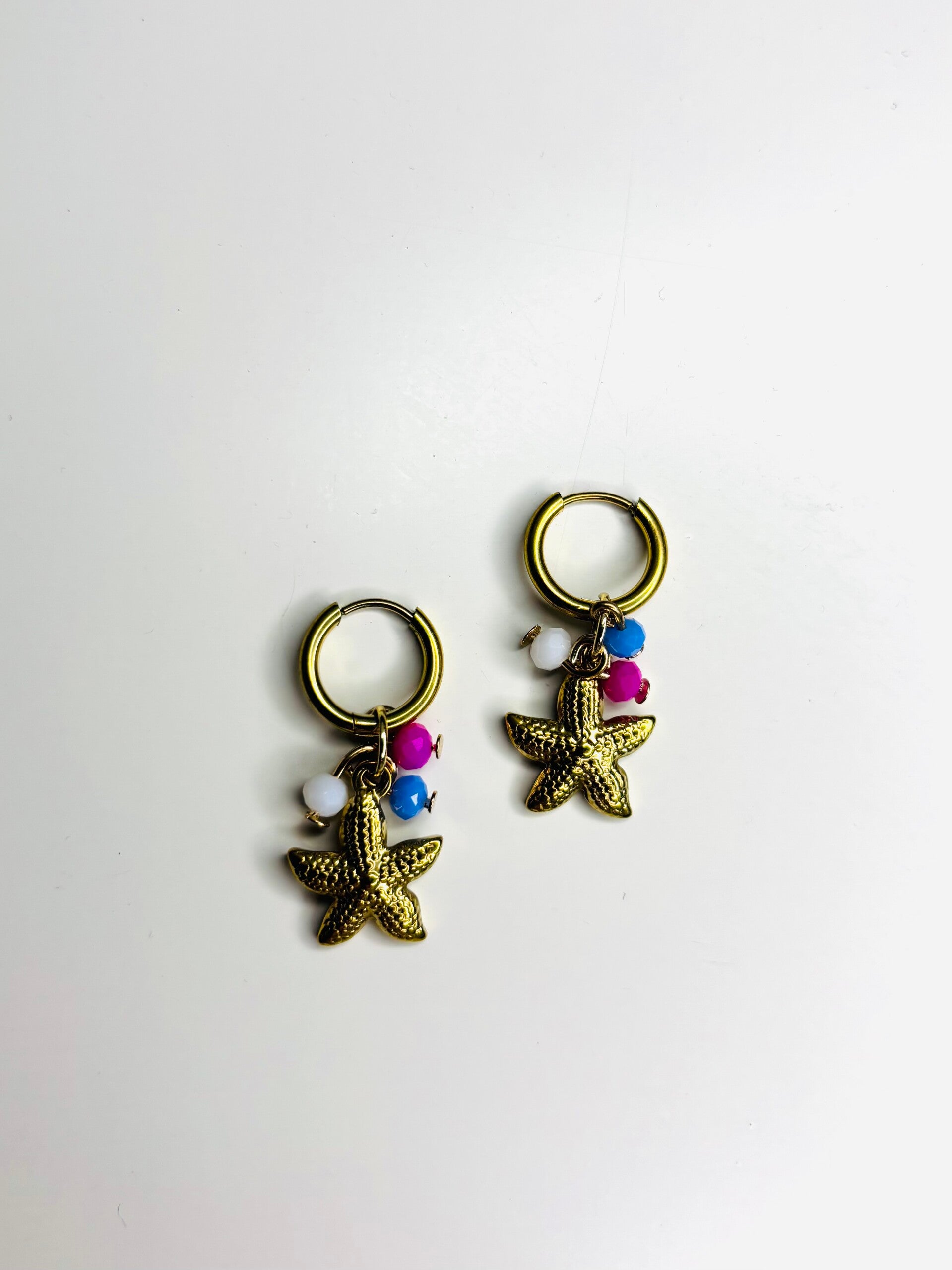 Seastar oorbellen goud