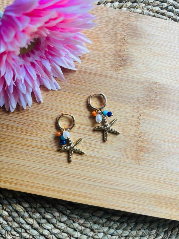 Big seastar oorbellen goud