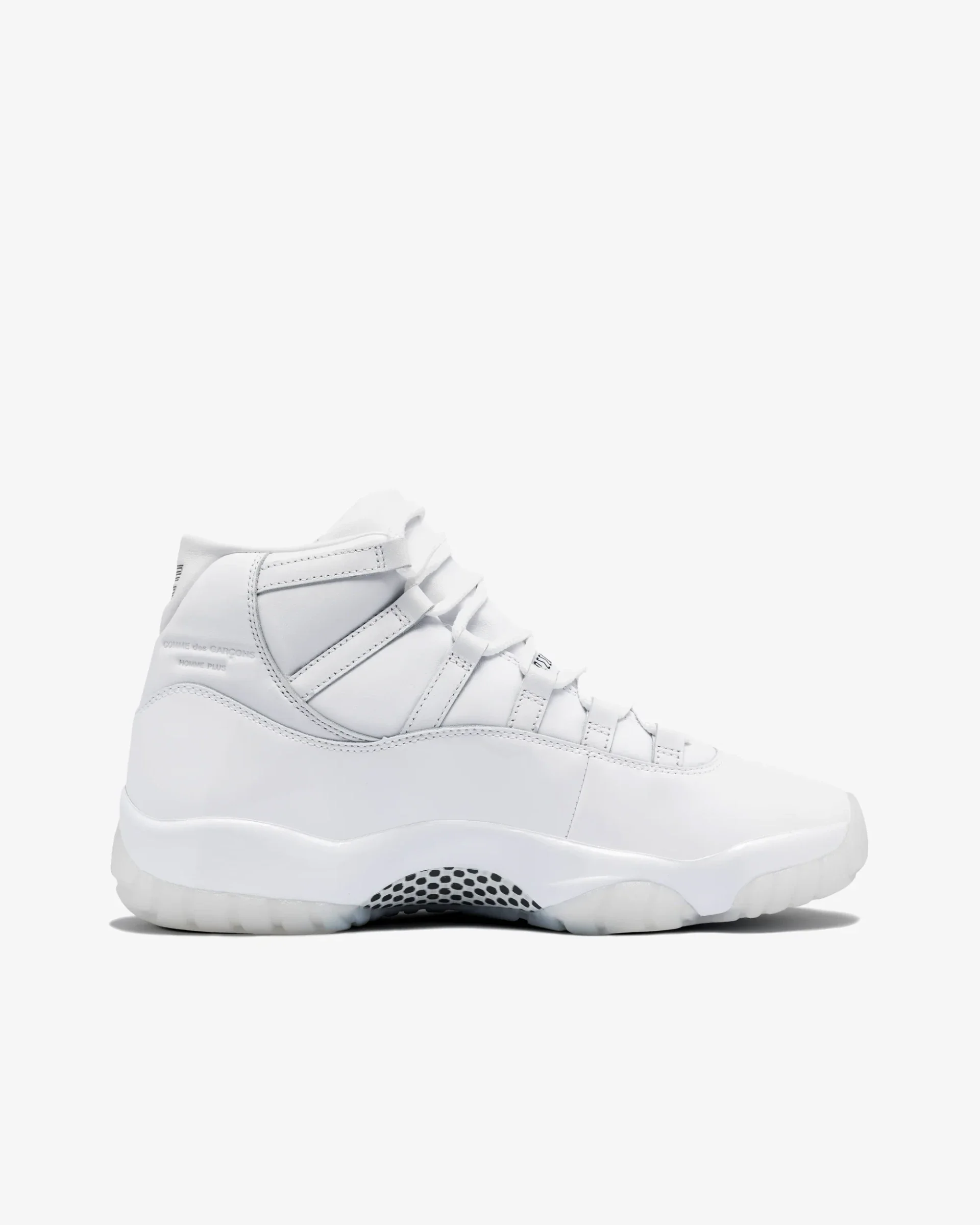 Air Jordan 11 Retro Comme des Garçons Homme Plus White
