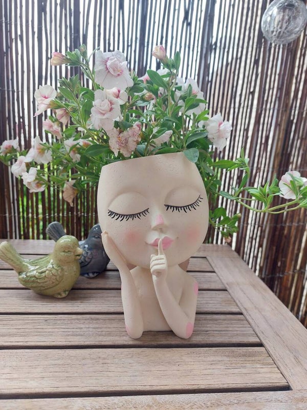 Bloempot vrouwen hoofd