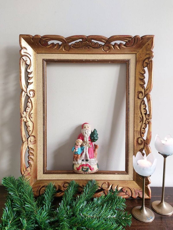 Vintage kerstman met hertje