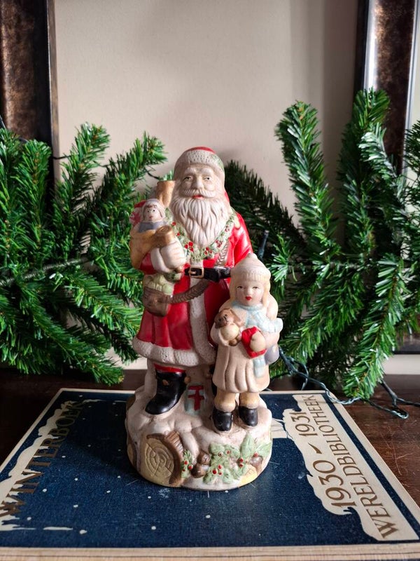 Vintage beeld kerstman kind