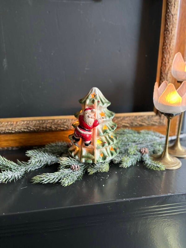 Waxinelicht kerstboom met kerstman