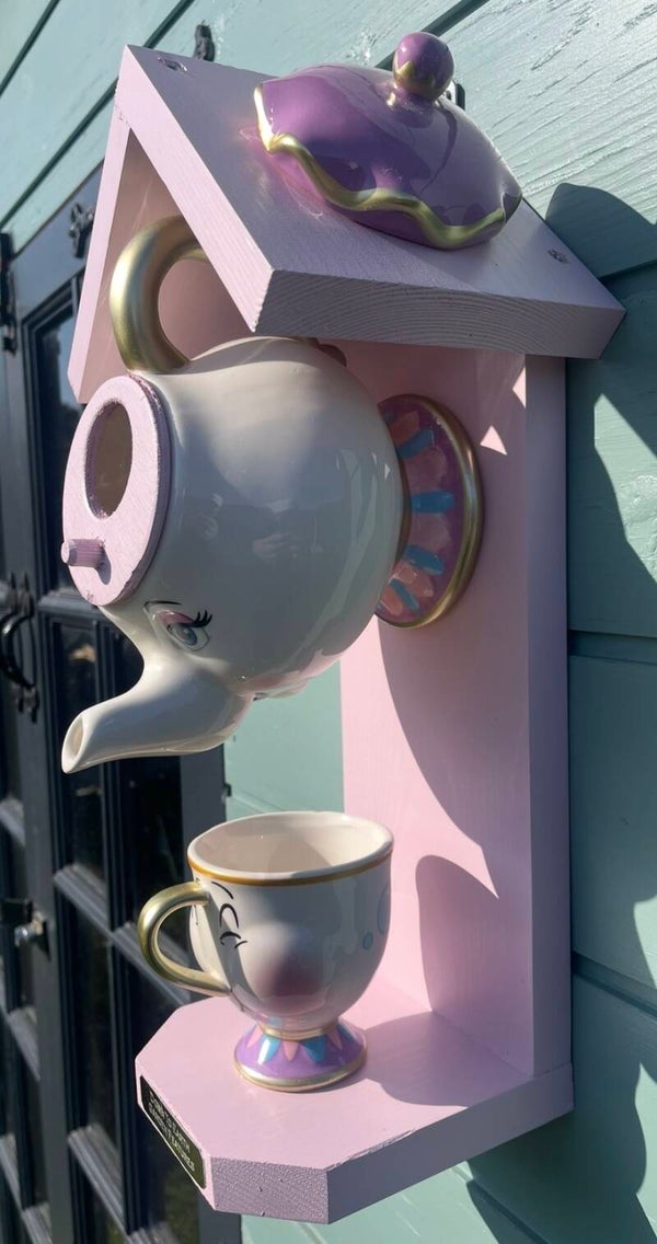 Mrs Potts and Chip garden feature bird feeder