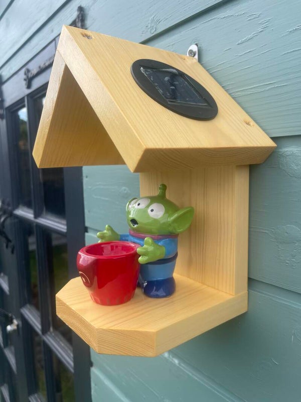 Toy Story Alien egg cup garden feature bird feeder with SOLAR light