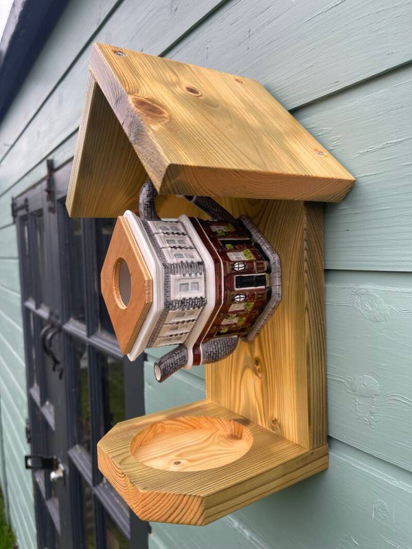 Queen Vic pub teapot garden feature bird feeder