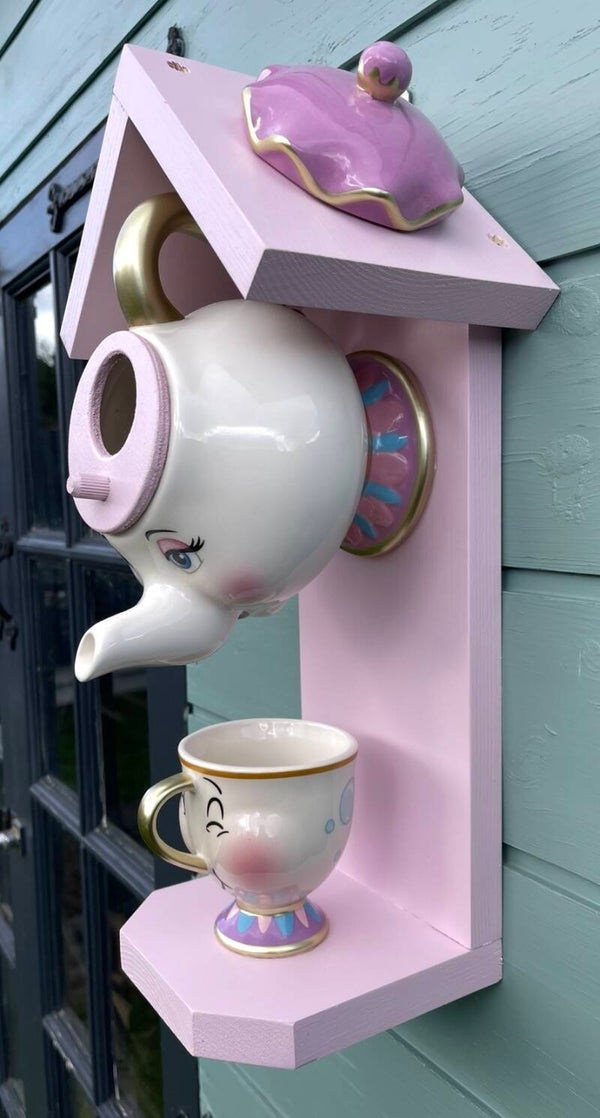 Mrs Potts and Chip garden feature bird feeder