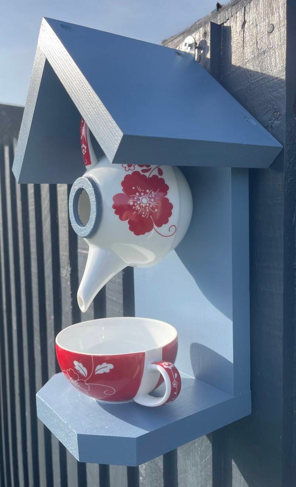 Red floral teapot set garden feature bird feeder