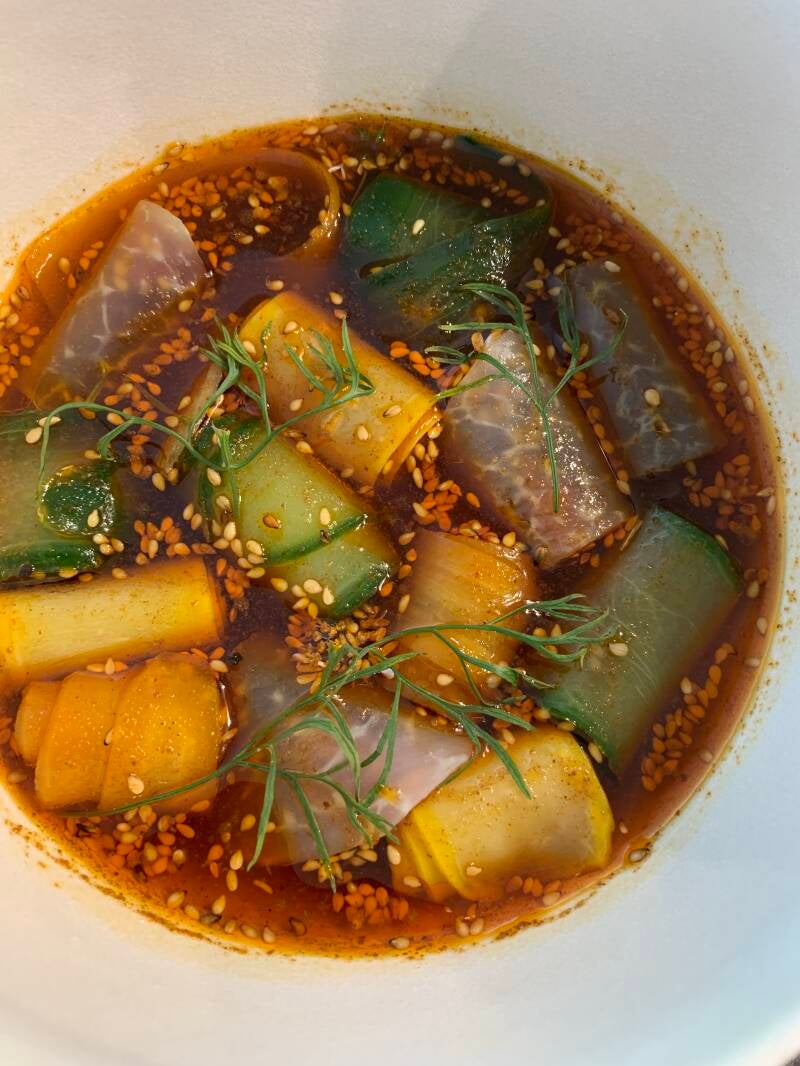 Mixed vegetable rolls with sesame and chili dressing.