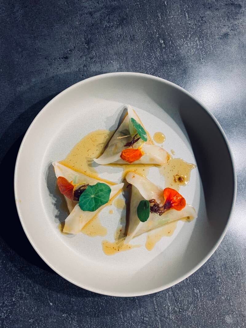 Local season vegetables dium sum, dried scallops and chili sauce.