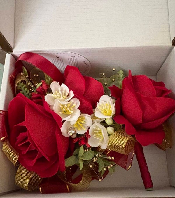 Red silk carnations and boutonnière