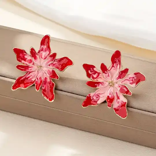 Bohemian oorbellen  fuchsia/roze bloem