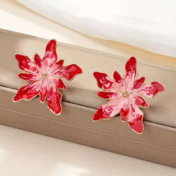 Bohemian oorbellen  fuchsia/roze bloem