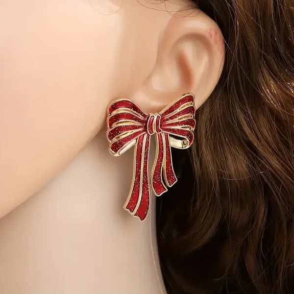 rode strik oorbellen