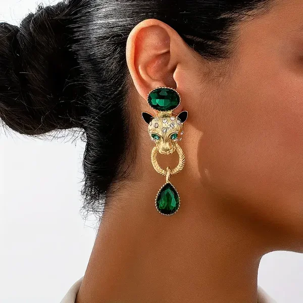 smaragd groene leeuwenkop oorbellen