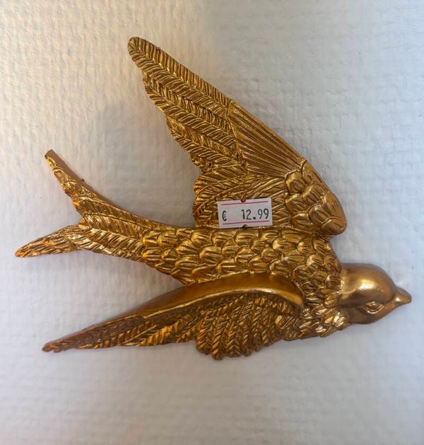 Nieuw gouden muurvogel
