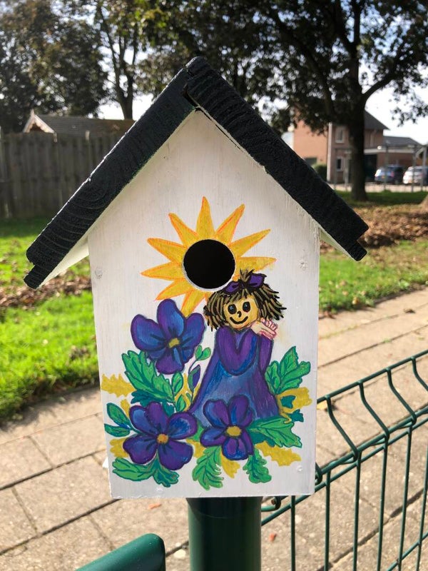 Vogelhuisje met zon