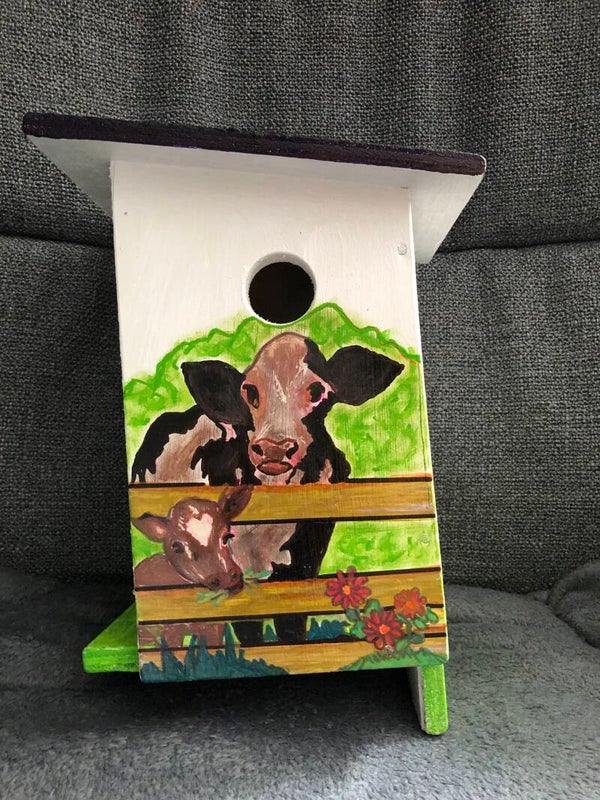 Vogelhuisje met koe