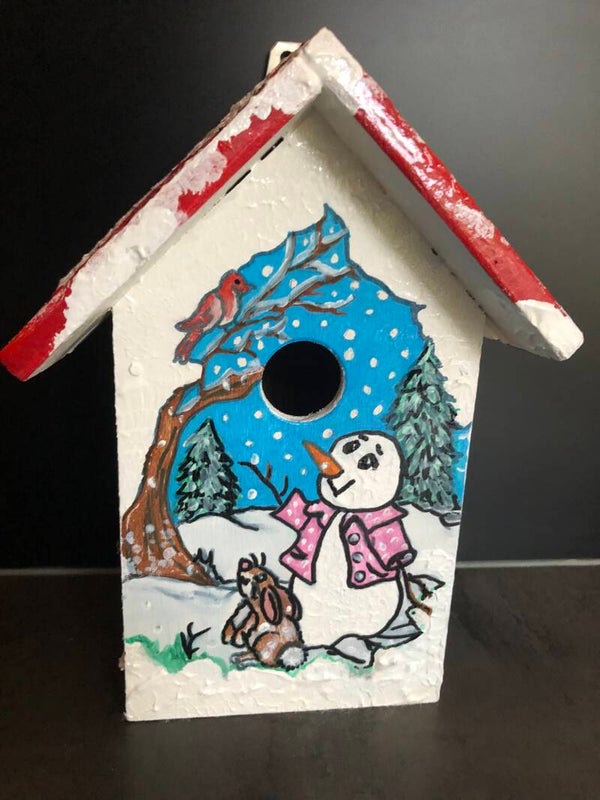 Vogelhuisje met sneeuwpop