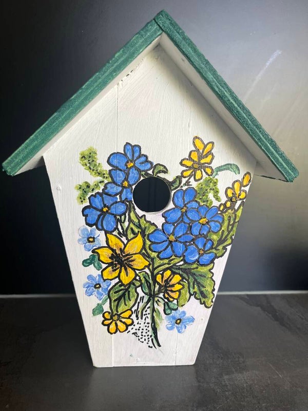 Vogelhuisje net vergeet-mij-nietjes