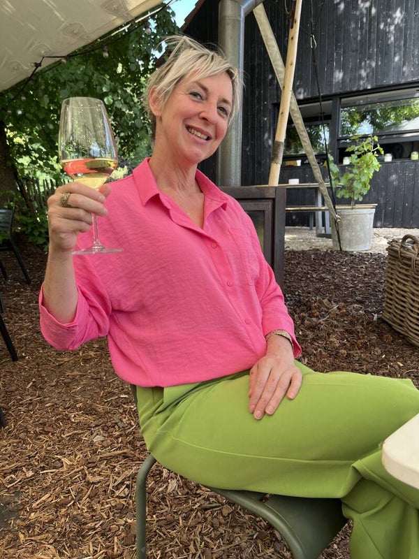losvallende roze blouse met 3/4 mouwen