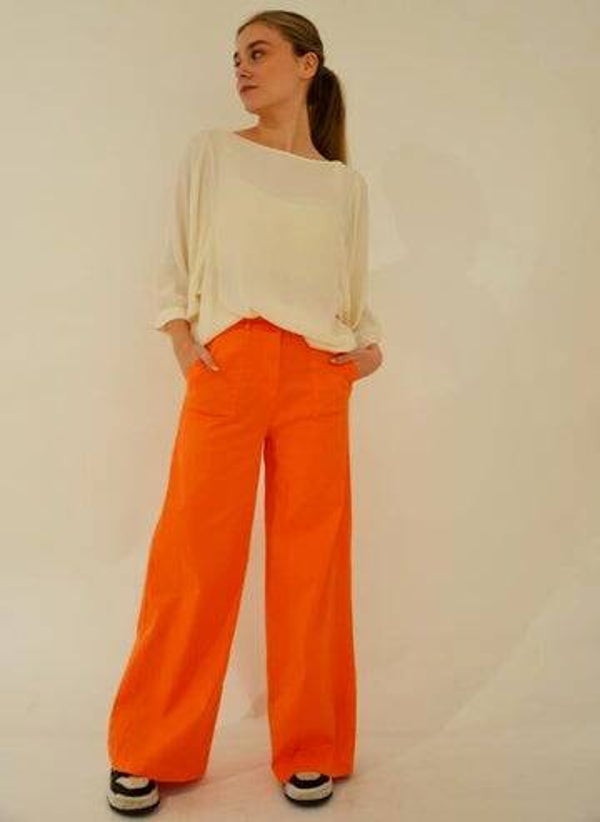 oranje broek met wijde pijpen