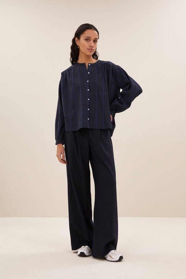 stijlvolle blauwe geruite blouse