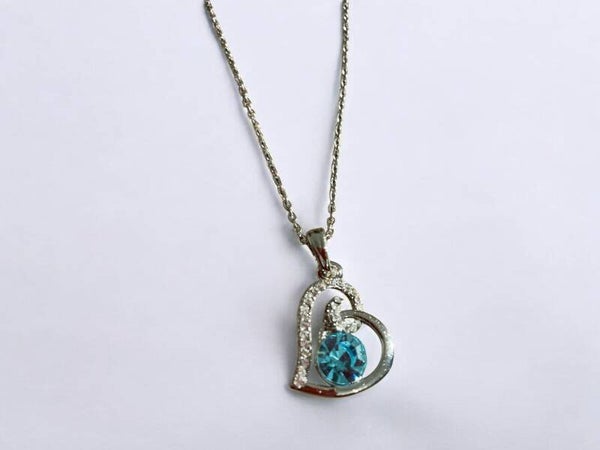 Zilverkleurig Hart ketting met blauwe strasssteen