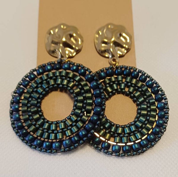 Oorbellen rond groot donkerblauw