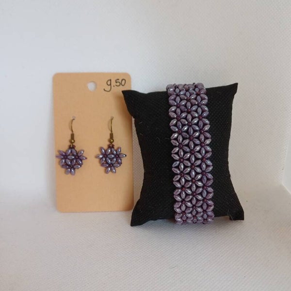Brede armband met oorbellen lila