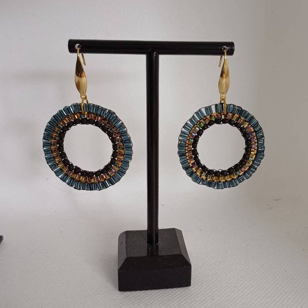 Oorbel transparant/zwart rond