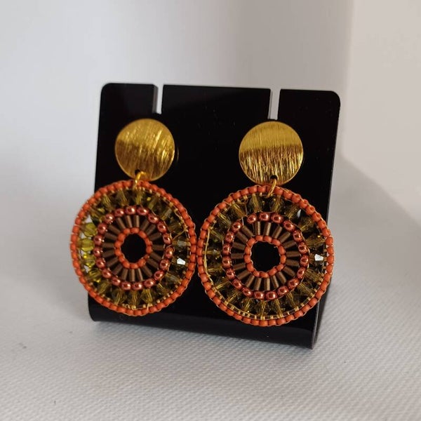 Oorbellen rond groot oranje / groen