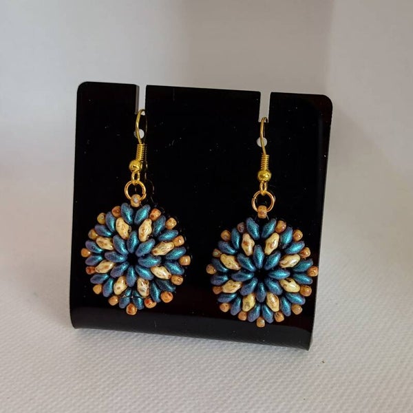 Oorbellen kraaltjes blauw/bruin