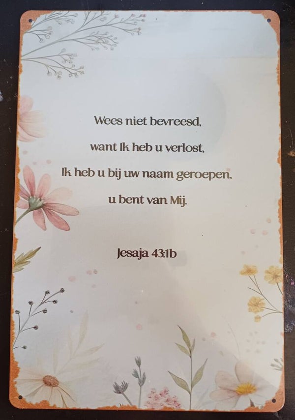 Metalen bordje met bijbeltekst