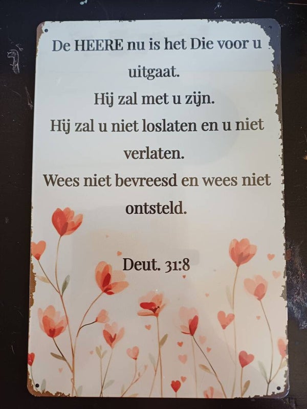 Metalen bordje met bijbeltekst