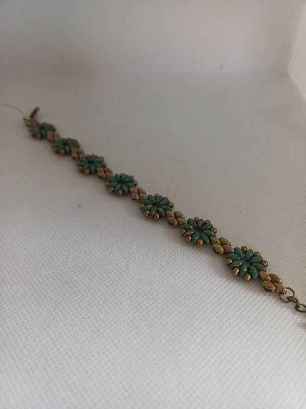Armband kraaltjes blauw/bruin