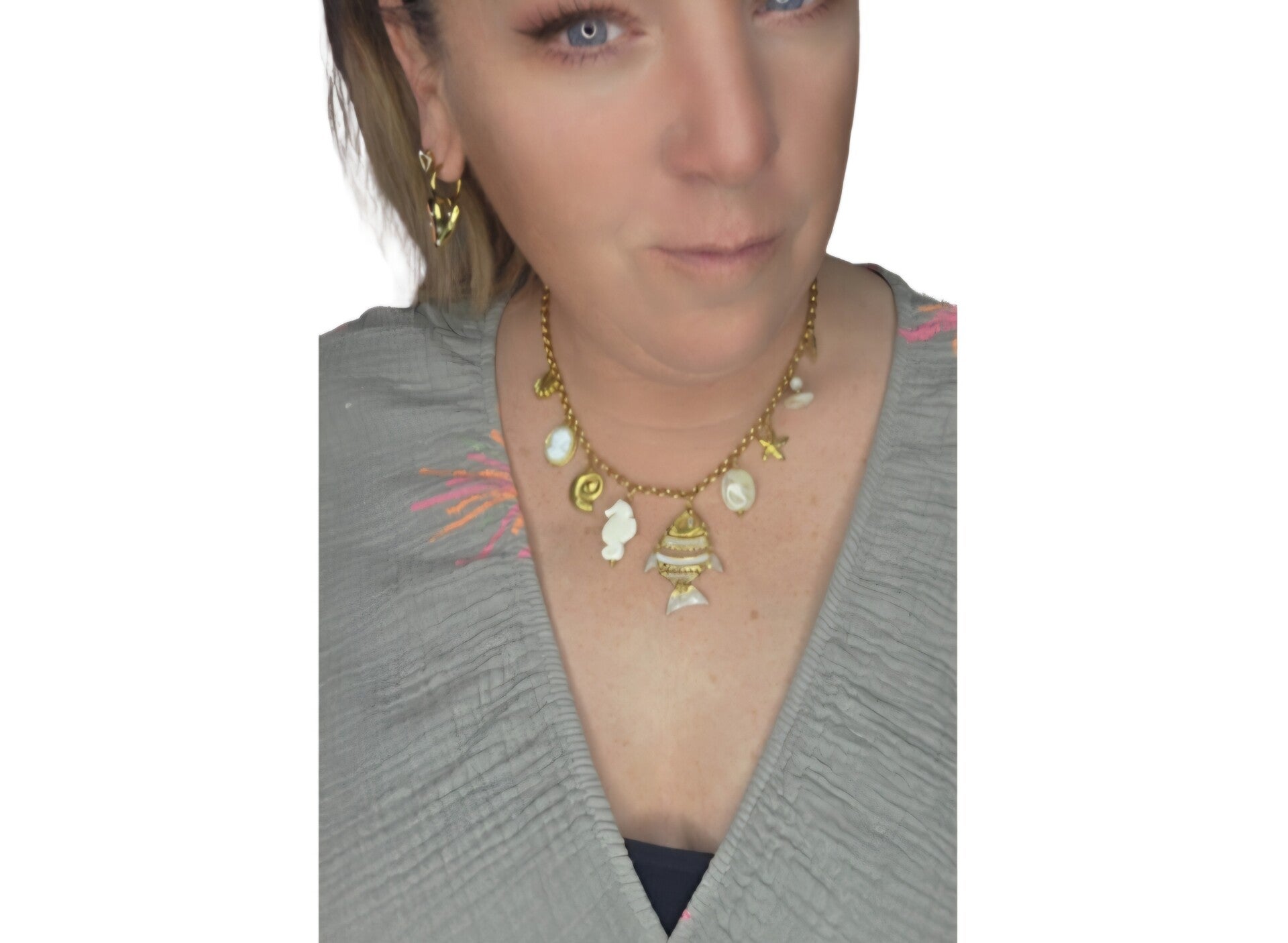 Bedelketting met zeedieren en vis. Wit/goud- Stainlesssteel