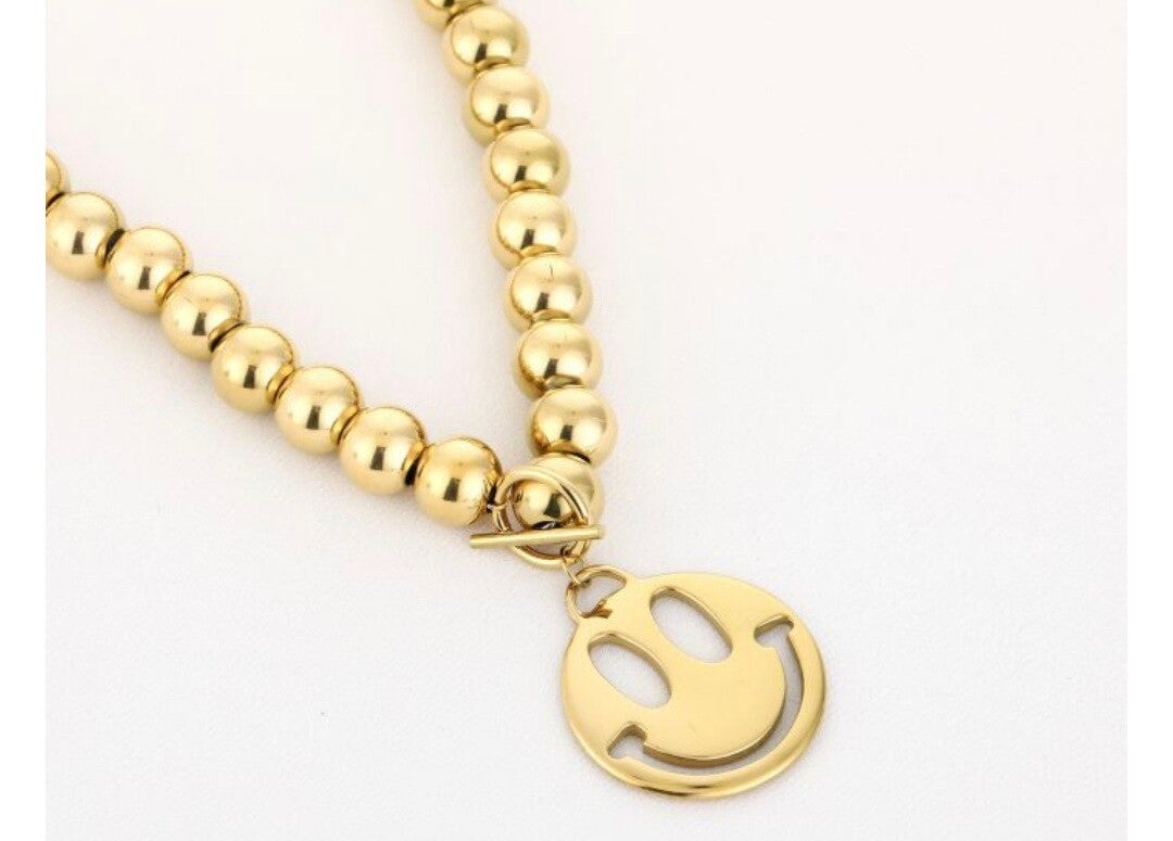 Statement smiley ketting goudkleurig Stainlesssteel