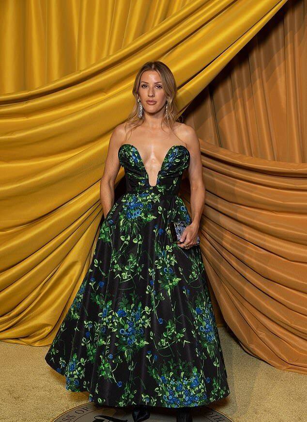ellie-goulding-dons-very-daring-gown-with-plunging-neckline-during-pfw-standard.jpg