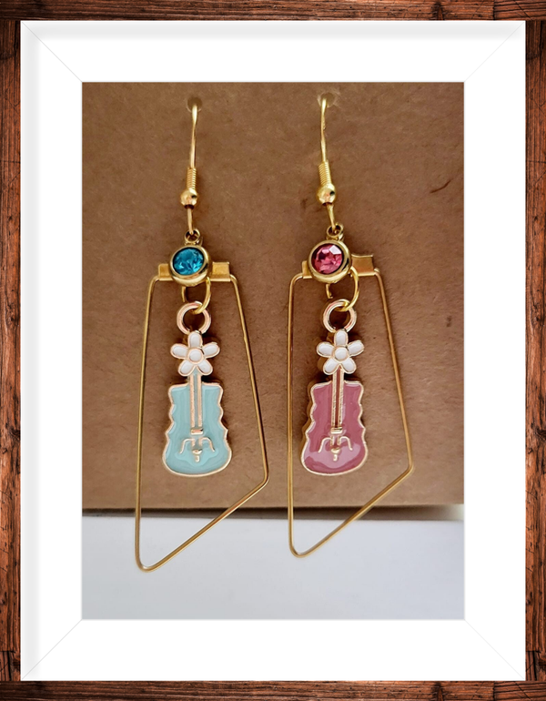 Boucles d’oreilles dorées asymetriques