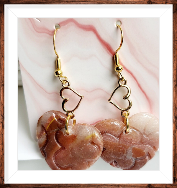 Boucles d’oreilles dorées coeur