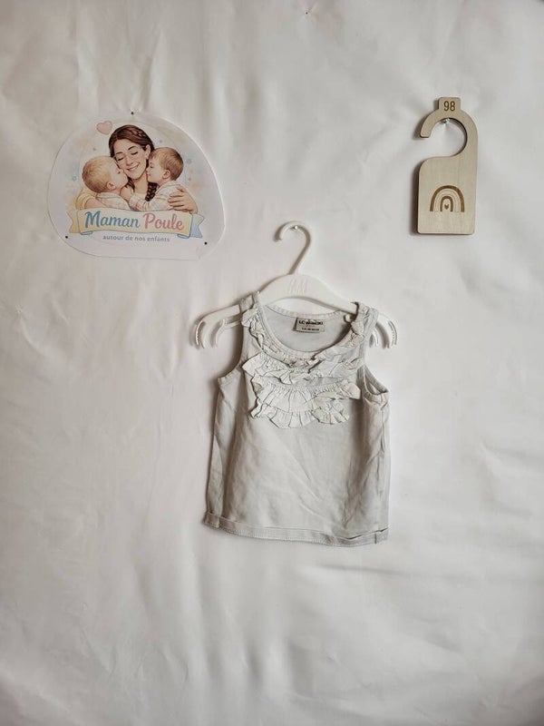Blouse blanche à volants T98