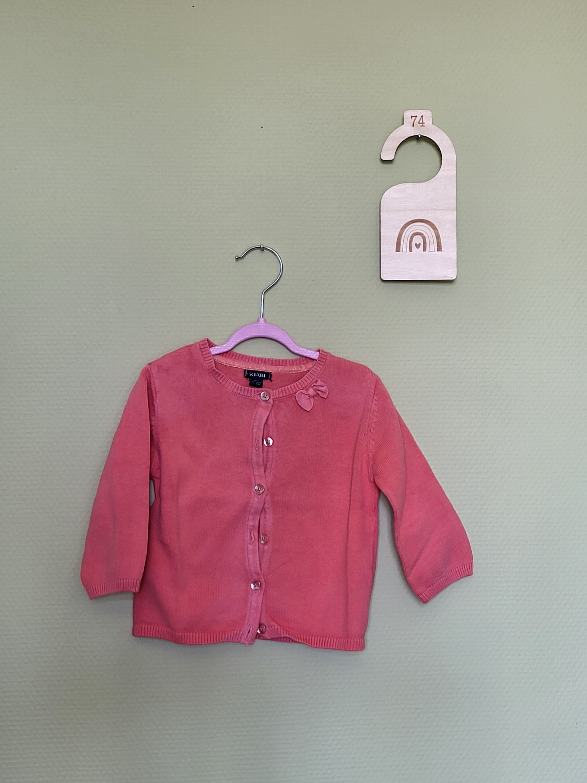 Gilet à boutons rouge pâle T74