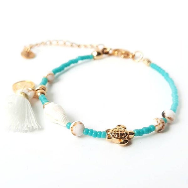 Turquoise Miuyki armbandje met schelp.