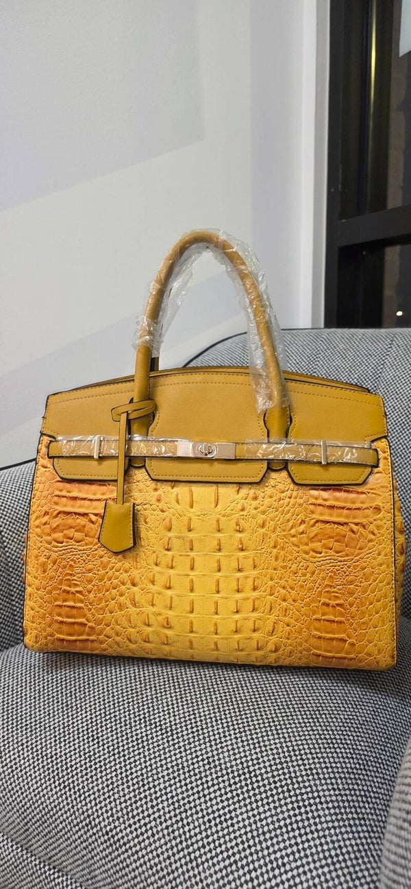 Mustard crocodile purse