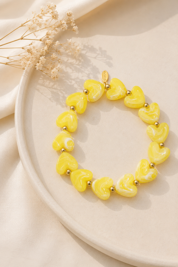 Gele Hartjes Armband met Stainless Steel Details