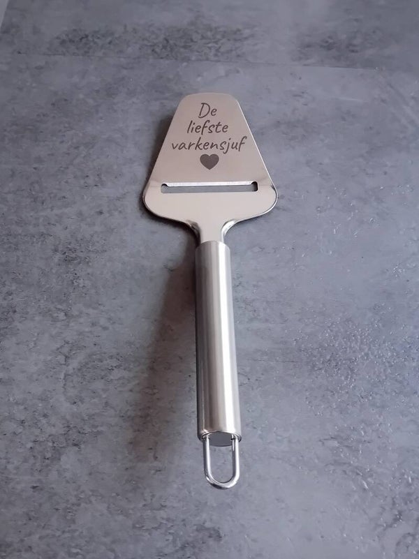 Kaasschaaf met tekst